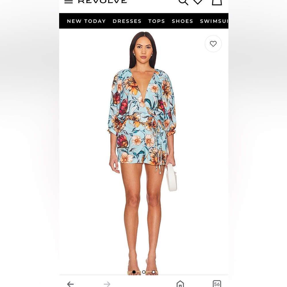 REVOLVE Agua Bendita. Floral Wrap Swim Romper in Sky Blue with Coral Accents